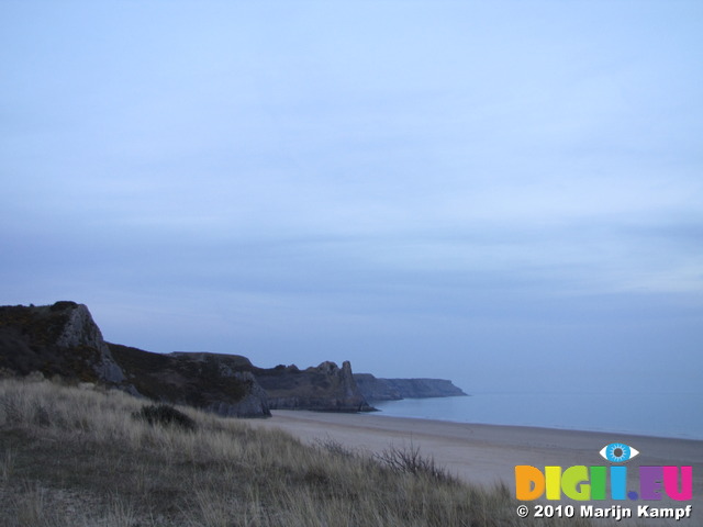 SX13763 Dusk over Great Tor and Three Cliff Bay from Nicholaston Burrows